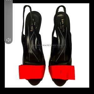 Kate Spade Heals with Red Ribbon on top.